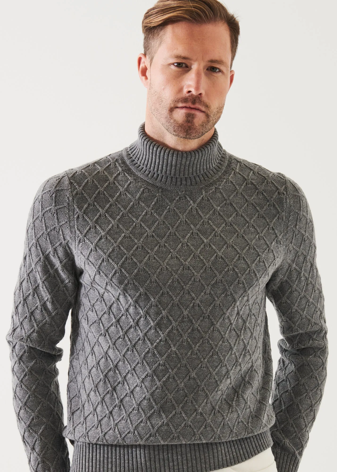 CABLE KNIT TURTLENECK